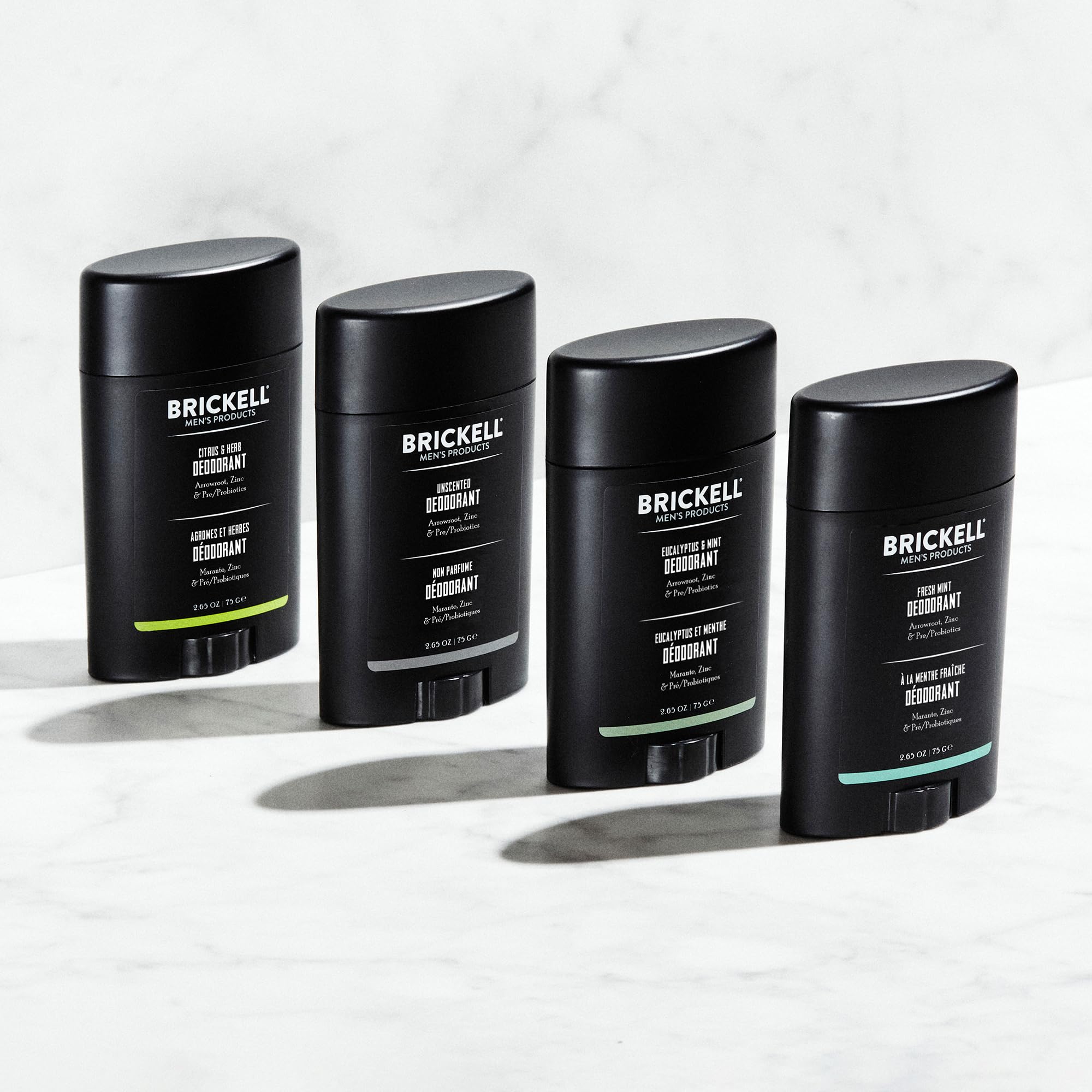 Brickell Men's Products deodorant applied to underarm showing easy glide and fresh scent benefit