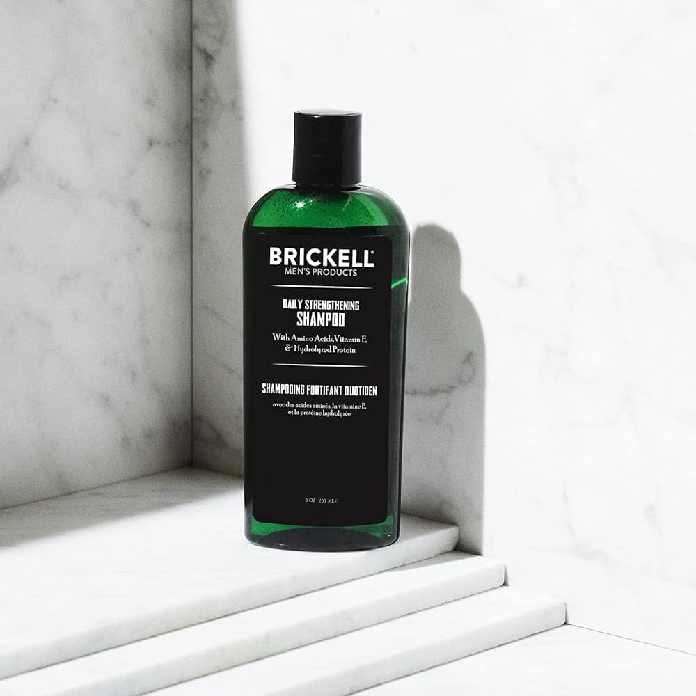 Brickell Men's Products shampoo pouring to show smooth foam and easy application benefit
