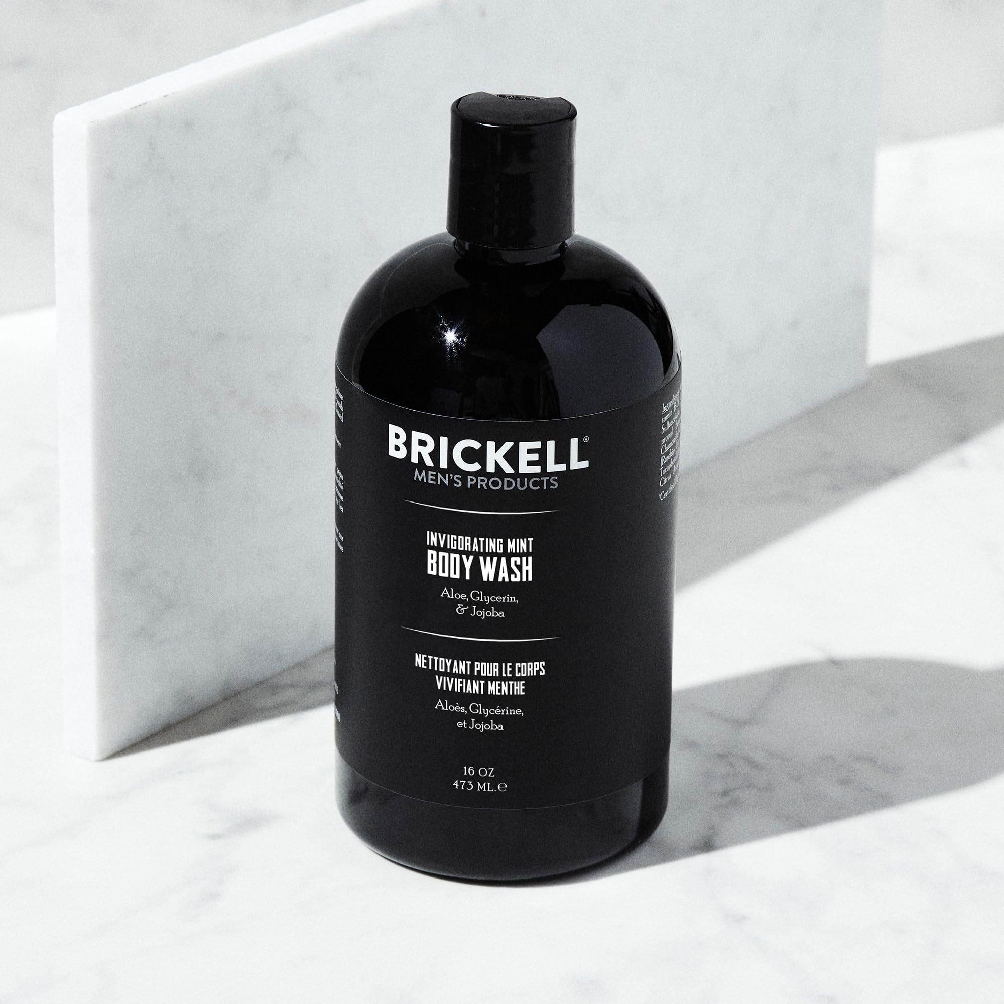 Brickell Men's Products pump and label close-up highlighting ingredients and easy dispensing
