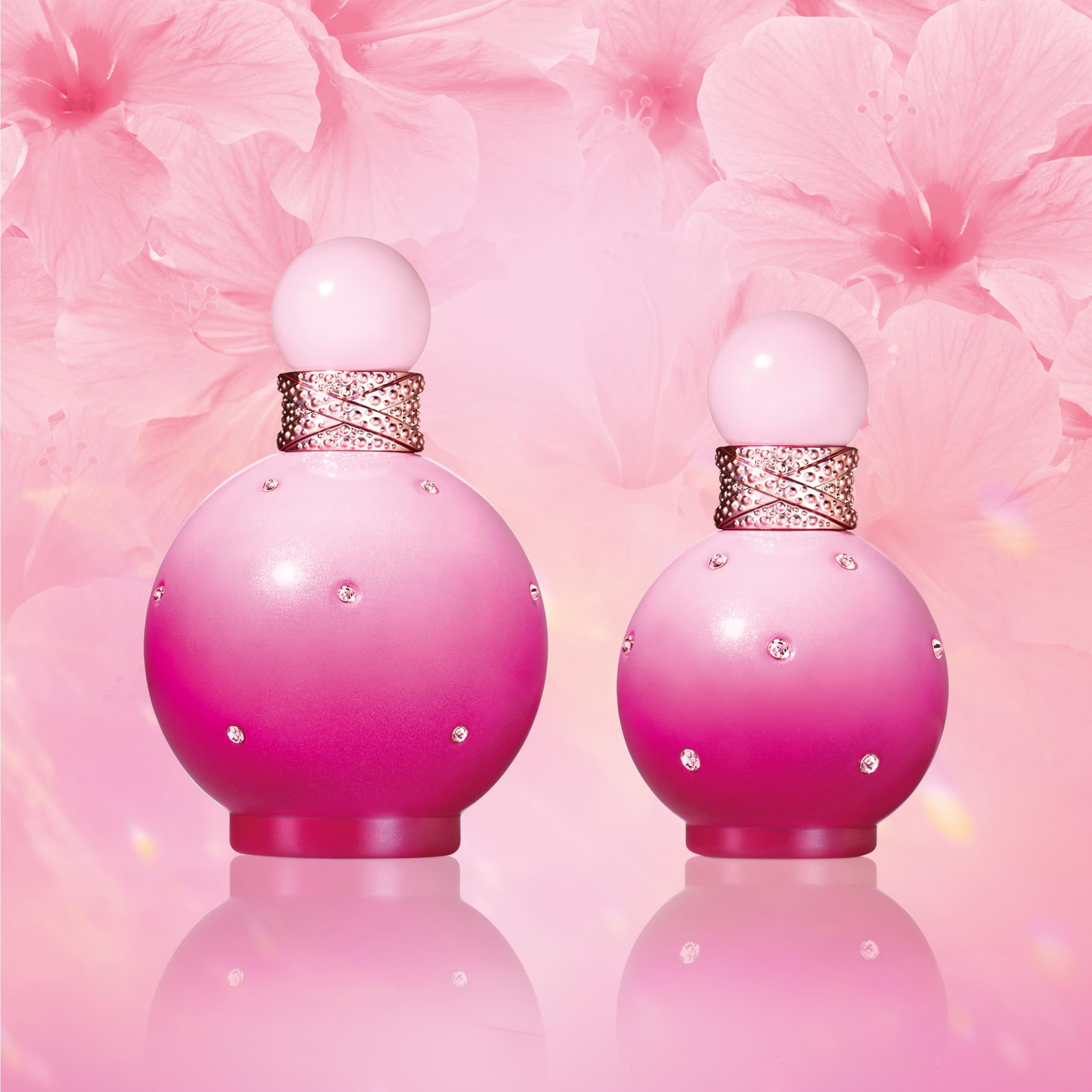 Britney Spears ingredient concept image with hibiscus and sweets showing scent notes benefit: gourmand-floral clarity