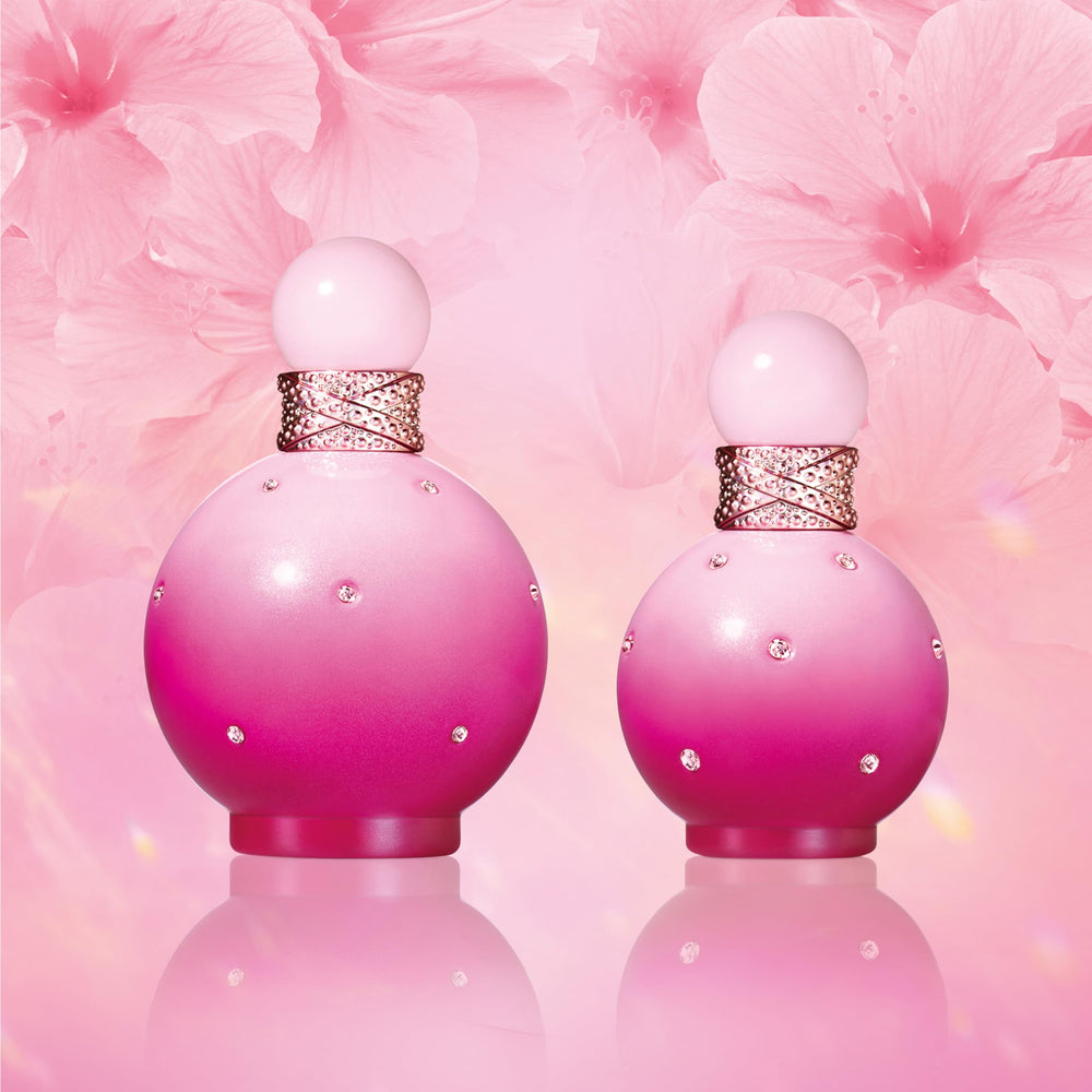 Britney Spears ingredient concept image with hibiscus and sweets showing scent notes benefit: gourmand-floral clarity