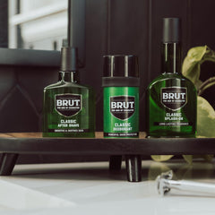 BRUT eight-pack beside a ruler illustrating compact size and convenient storage