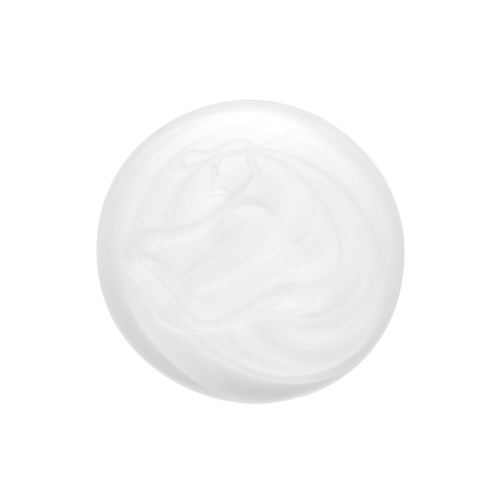 Bumble and bumble shampoo texture pouring from bottle showing moisturizing, creamy lather