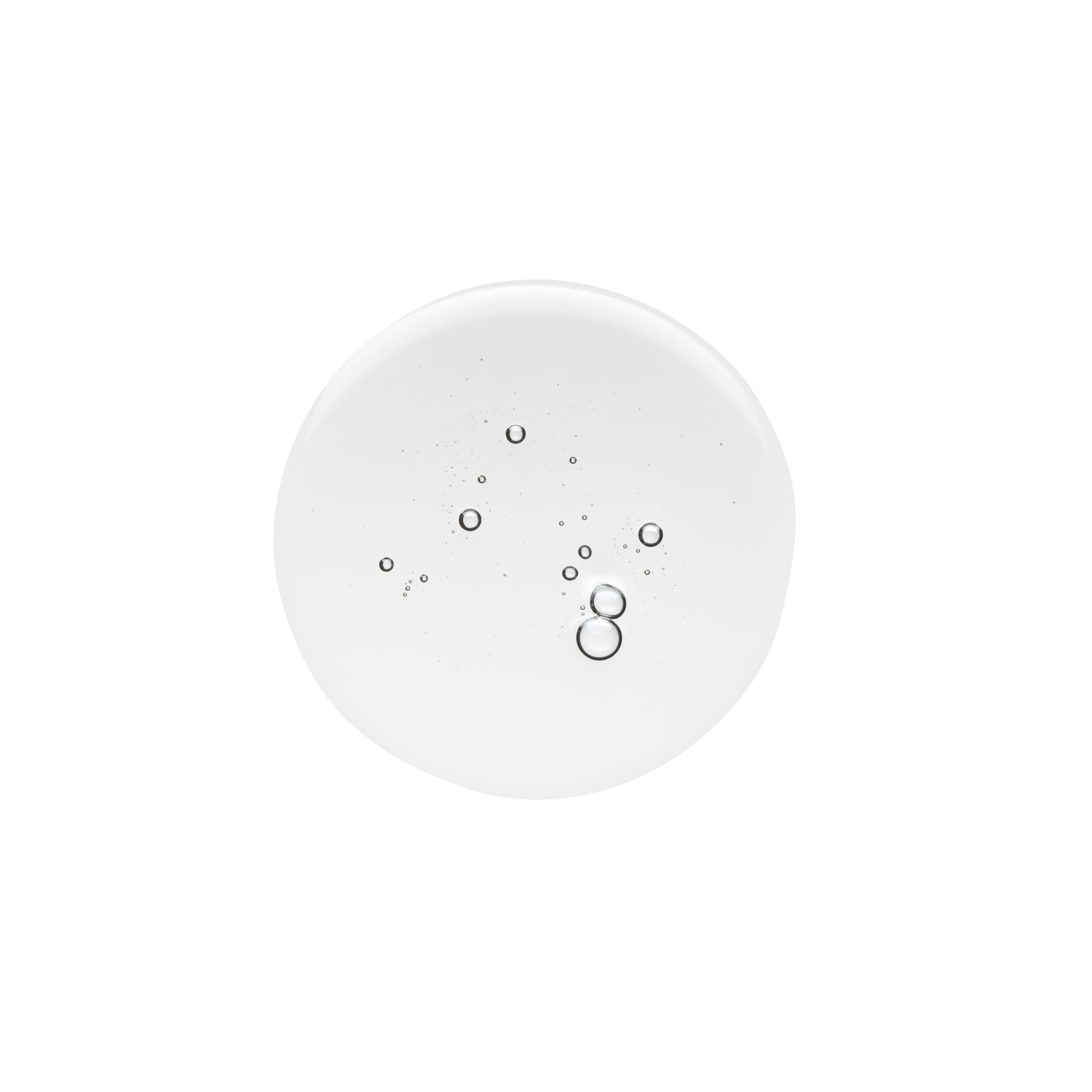 Bumble and bumble dropping oil into hand for controlled application and quick absorption