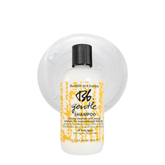 Bumble and bumble front bottle showing label and moisturizing promise