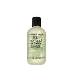 Bumble and bumble front bottle view showing clean packaging and benefit