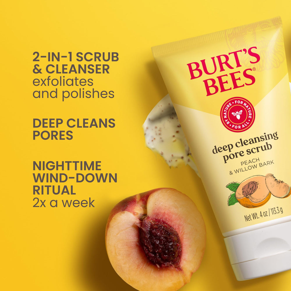 Burt's Bees peach stone granules on fingertip illustrating fine polish