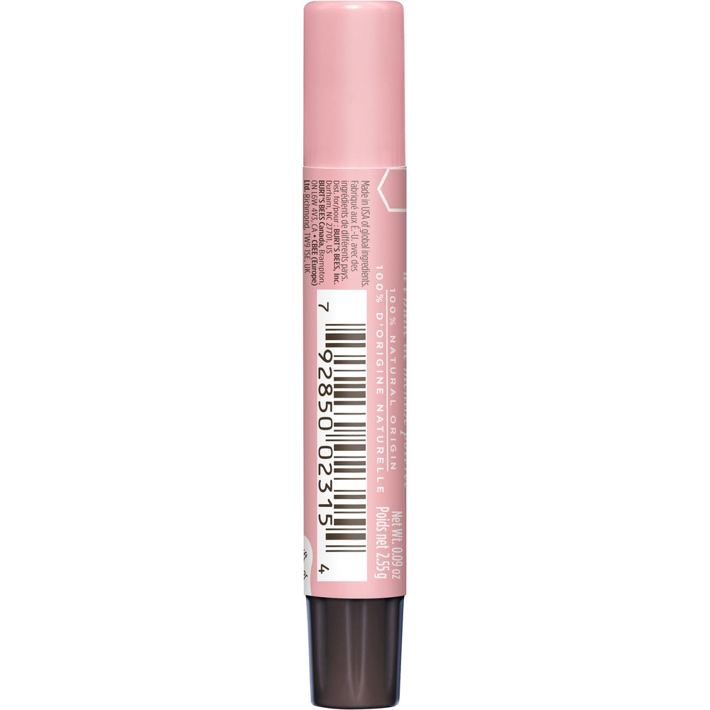 Burt's Bees applied on lips demonstrating peachy shimmer and soft finish