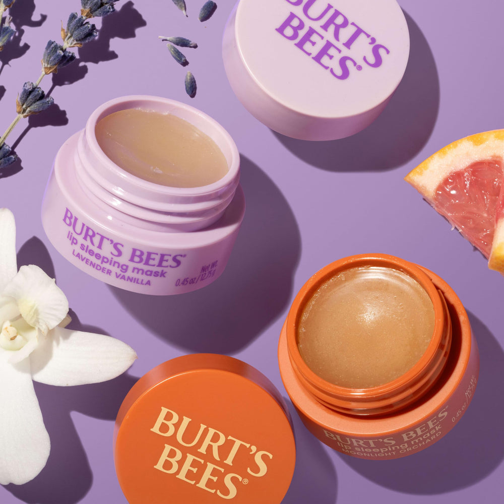 Burt's Bees natural origin badge beside jar emphasizing clean-ingredient benefit