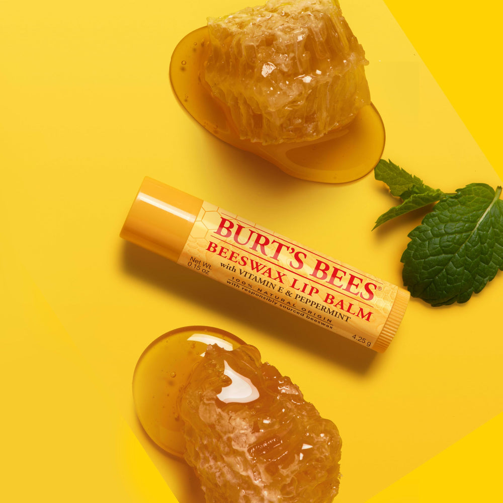 Burt's Bees tube in a pocket illustrating convenient on-the-go use
