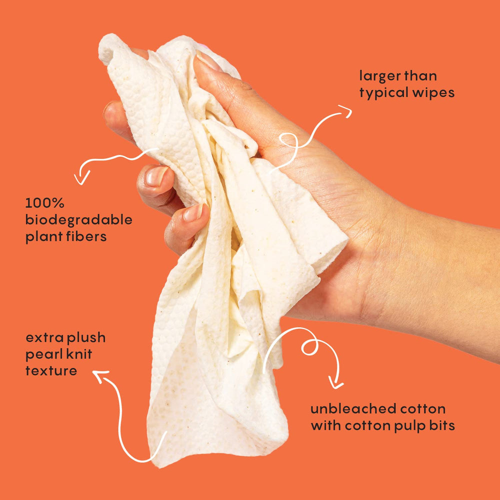 BUSYCO wipe in hand wiping underarm demonstrating quick freshen benefit