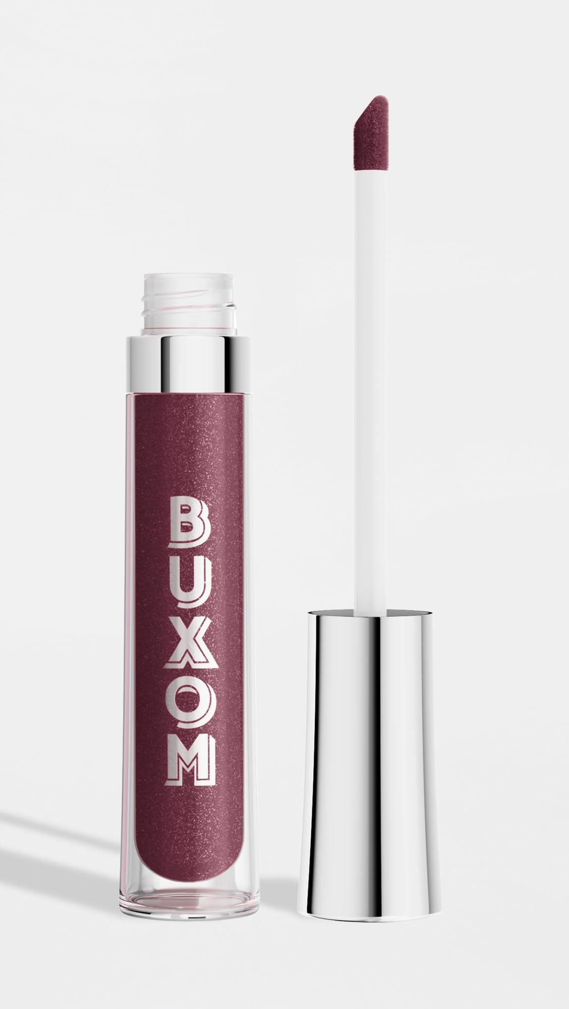 Buxom wand applicator applying gloss smoothly for precise, even coverage