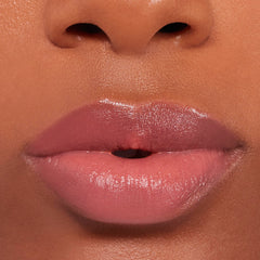 Buxom inner glow applied on lips demonstrating natural custom tint benefit