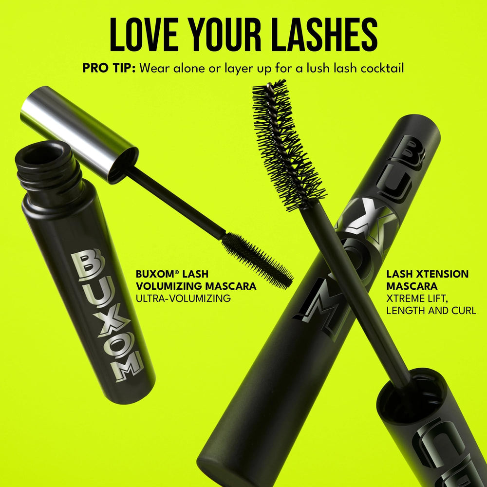 Buxom model applying mascara showing easy application and eye‑opening lift