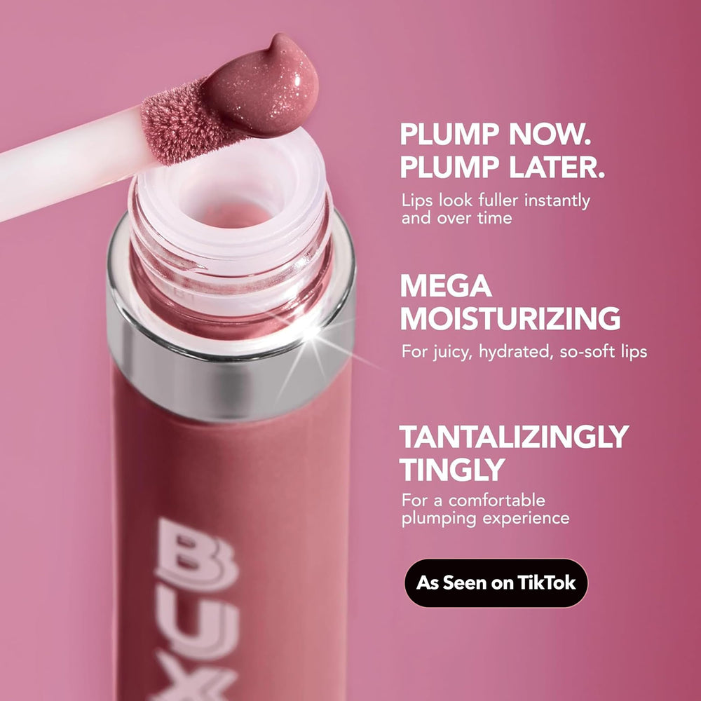 Buxom gloss in a beauty flatlay emphasizing layering and styling benefit