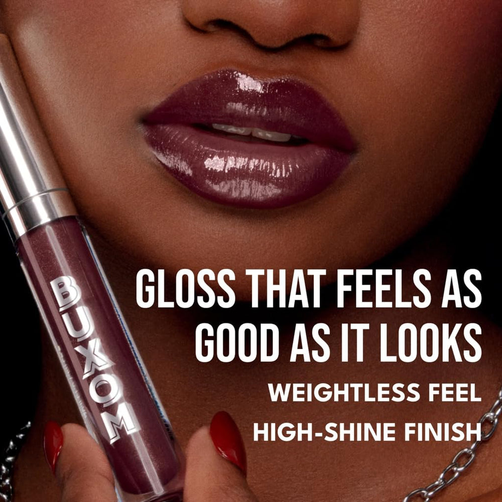 BUXOM gloss on lips closeup giving fuller, luminous appearance