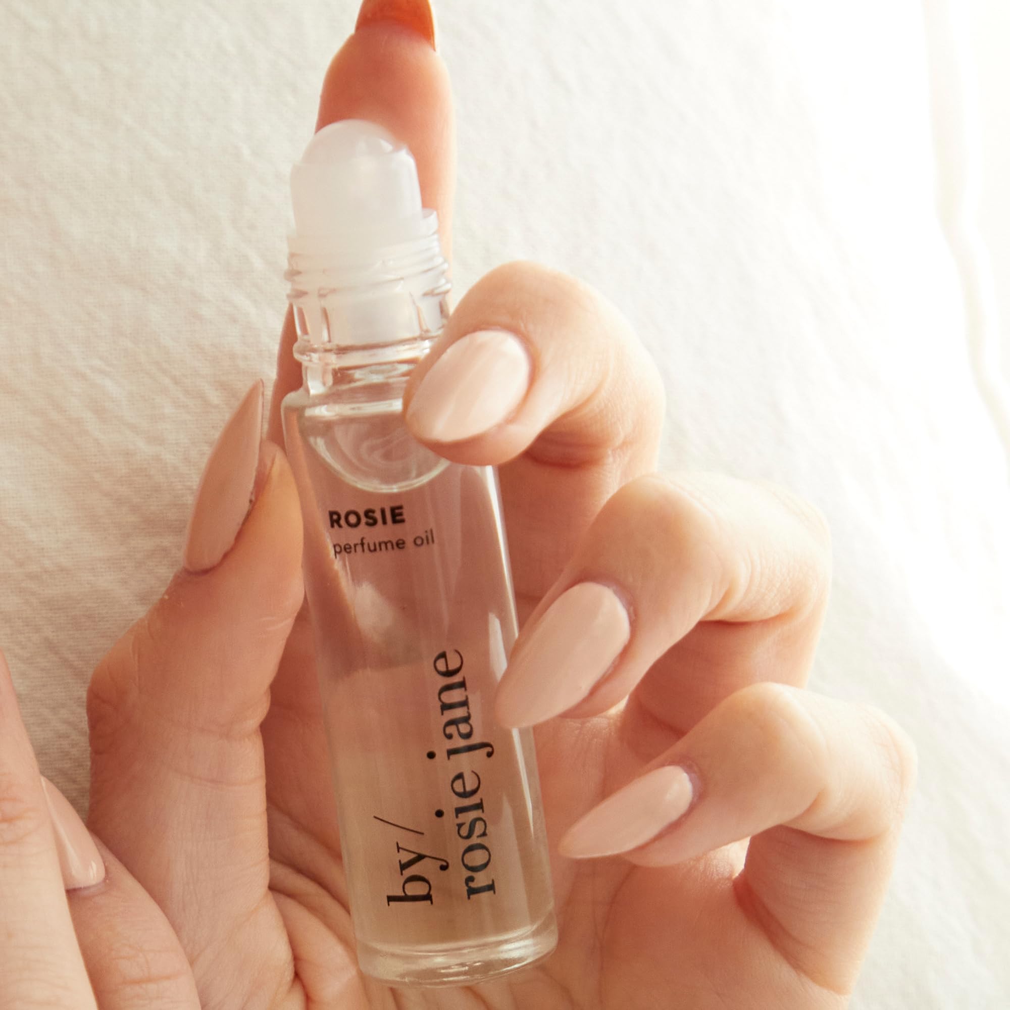 By Rosie Jane roll-on applicator close-up demonstrating precise mess-free application benefit
