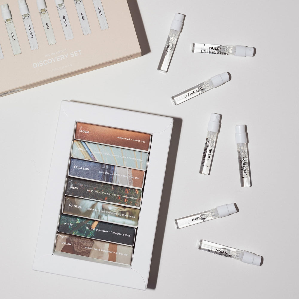 By Rosie Jane vials held in hand to show travel size and easy portability