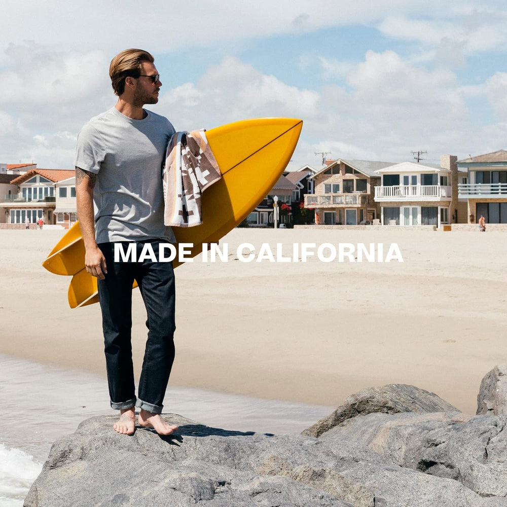 BYRD lifestyle beach bag with Surfspray to convey portability and California surf-inspired scent