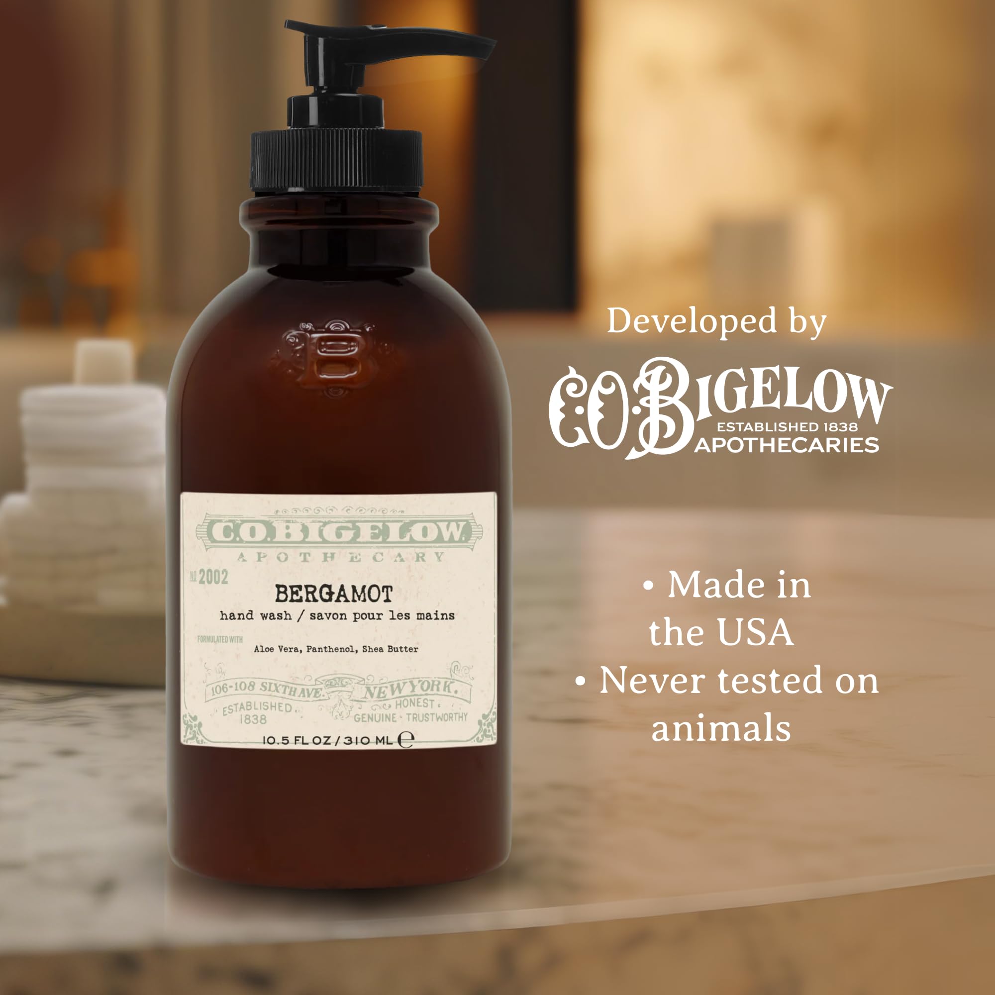 C. O. Bigelow bottle beside a soap dish showing true 10.5 fl oz scale
