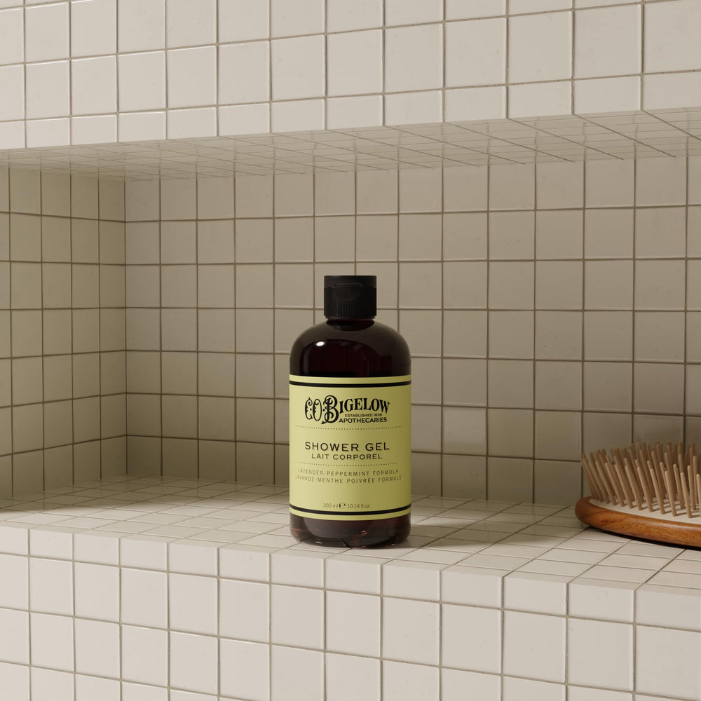 C. O. Bigelow shower gel in use in shower offering an invigorating experience