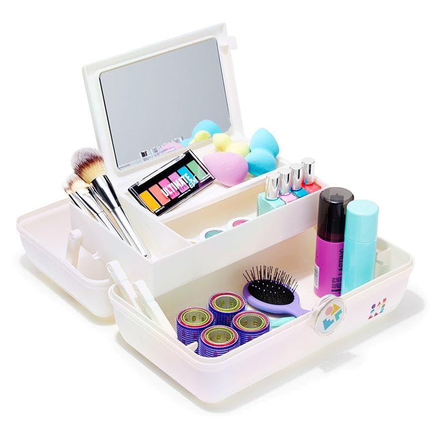 Caboodles scale with brushes illustrating spacious interior fits large tools