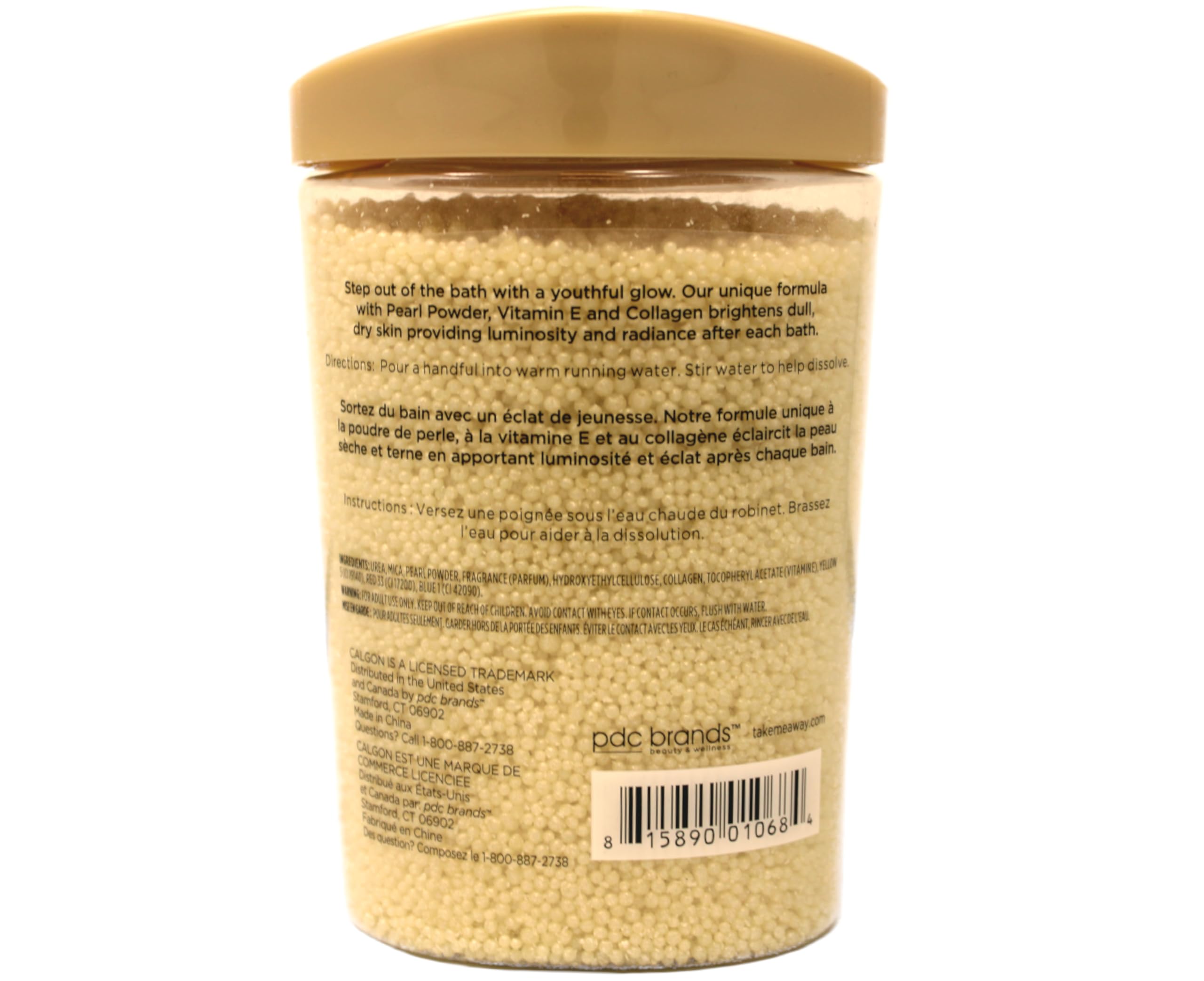 Calgon lifestyle shot of a filled bathtub with pearls dissolving, creating a relaxing soak
