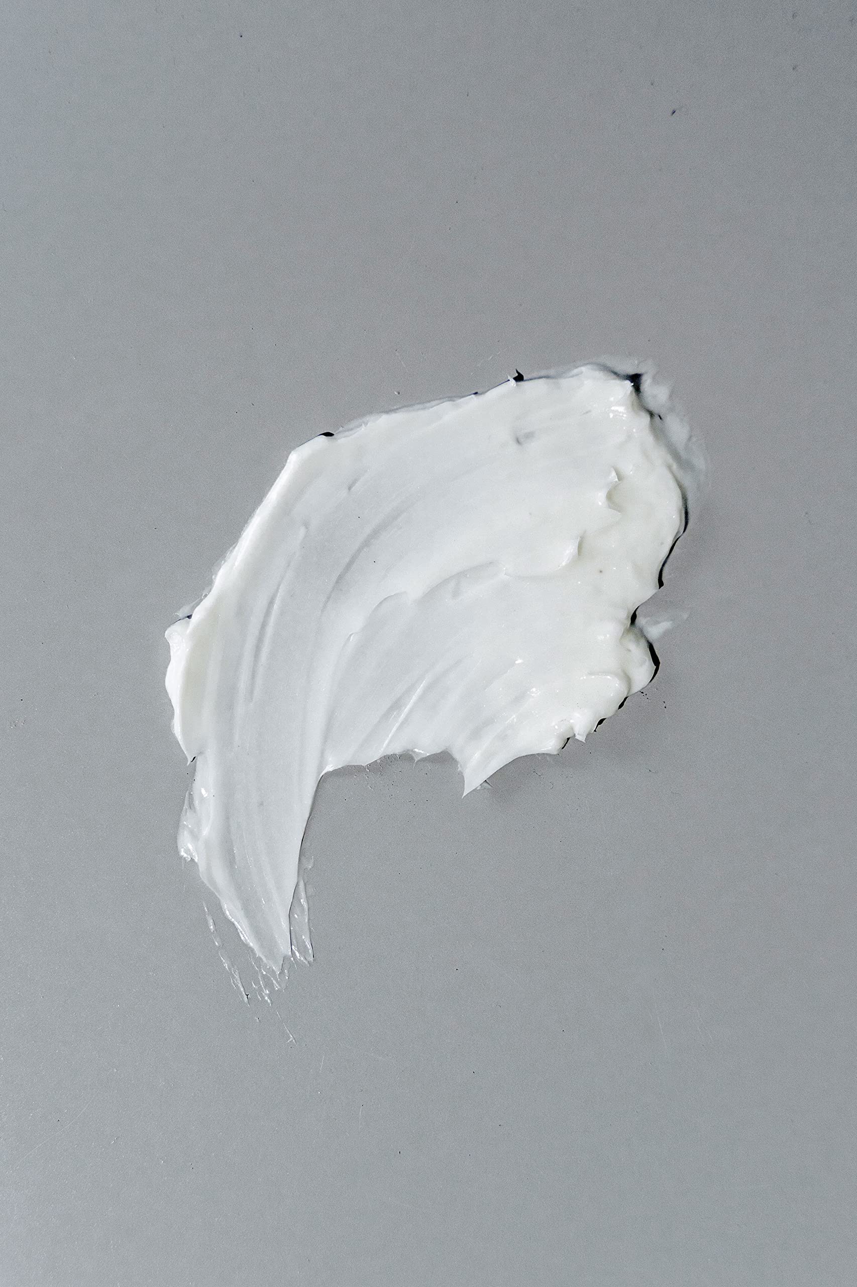 California Born product in hands demonstrating easy spread and quick application benefit