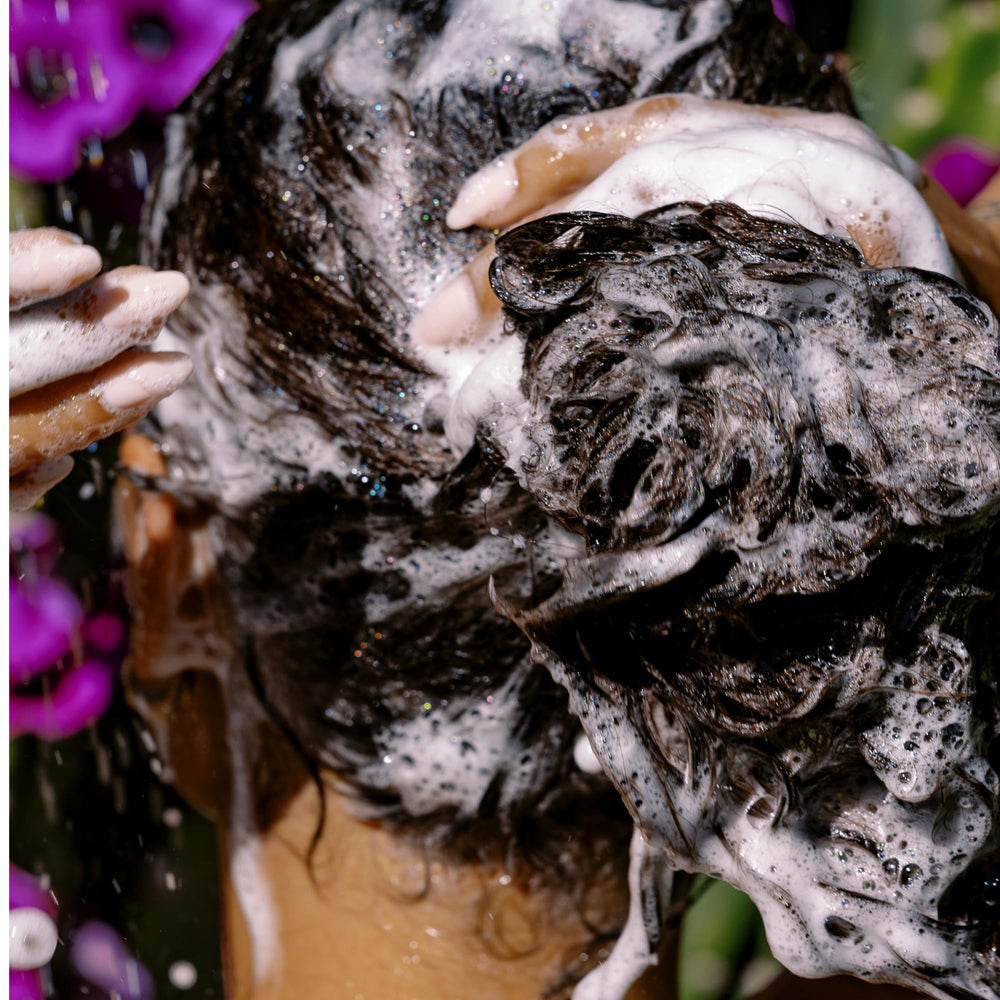 California Naturals detangled curly hair after use showing defined, frizz-reduced curls