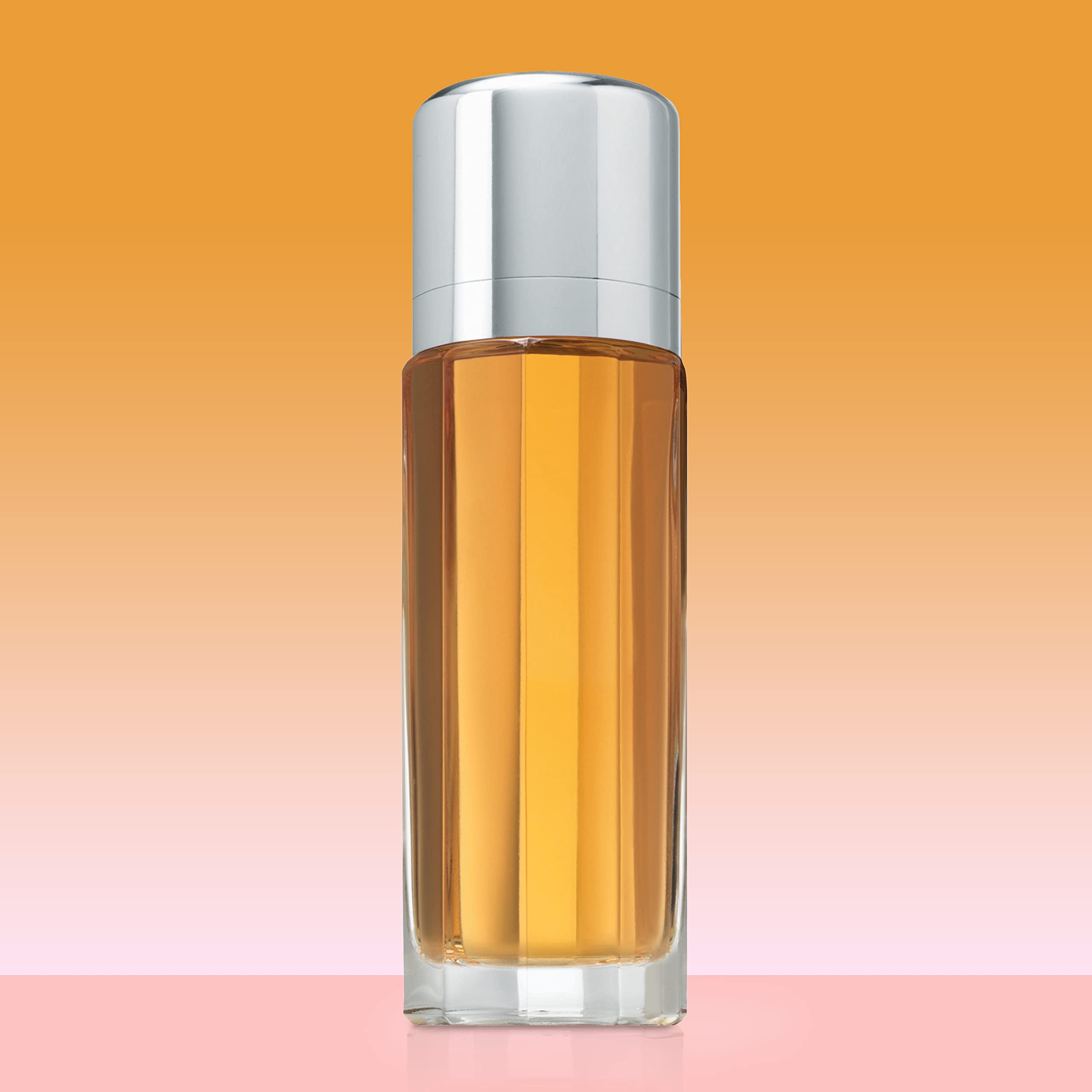 Calvin Klein Escape spray mist in use conveying fresh application benefit