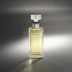 Calvin Klein Eternity being sprayed to show application and immediate fresh florals
