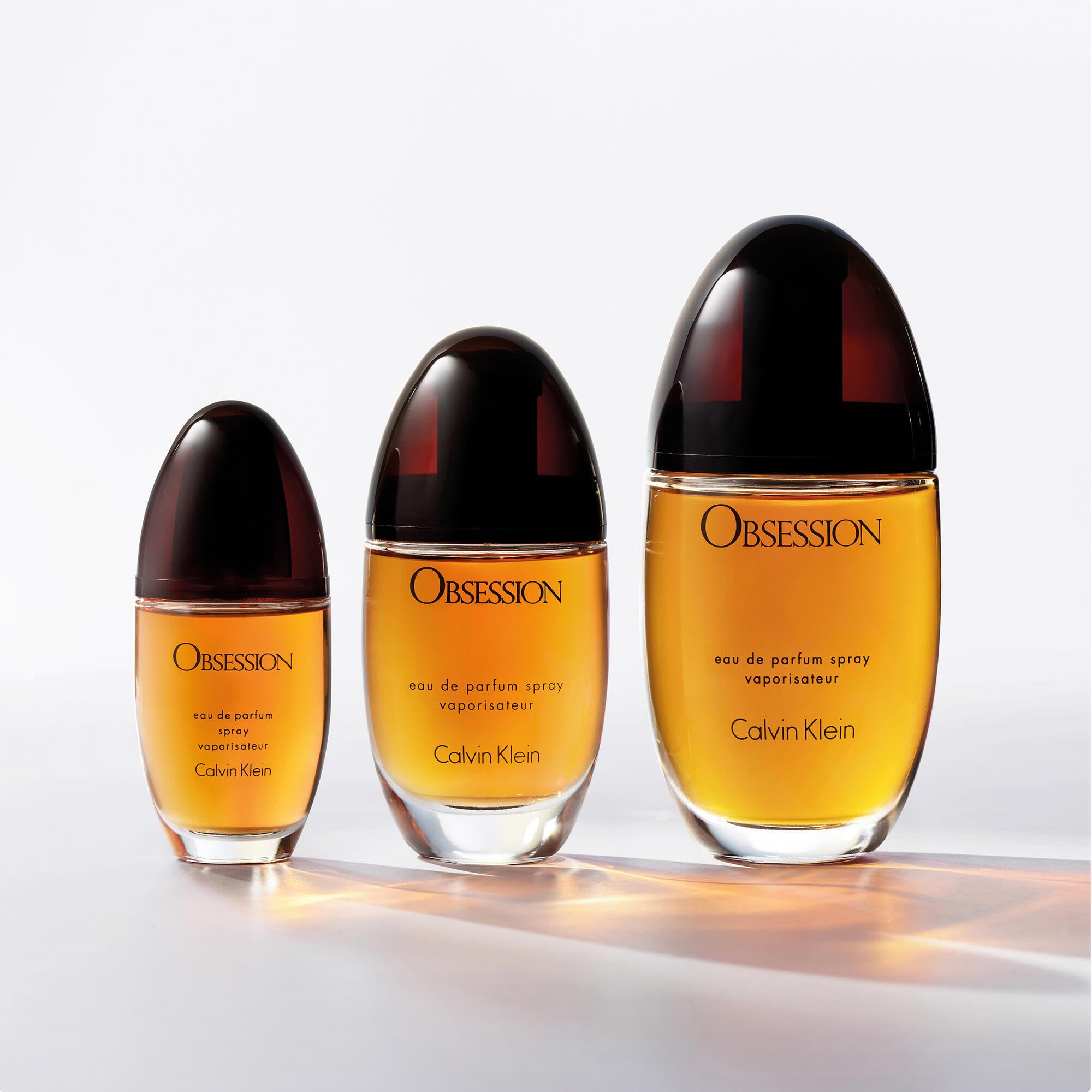 Calvin Klein Obsession on a vanity styled to suggest evening wear confidence and allure