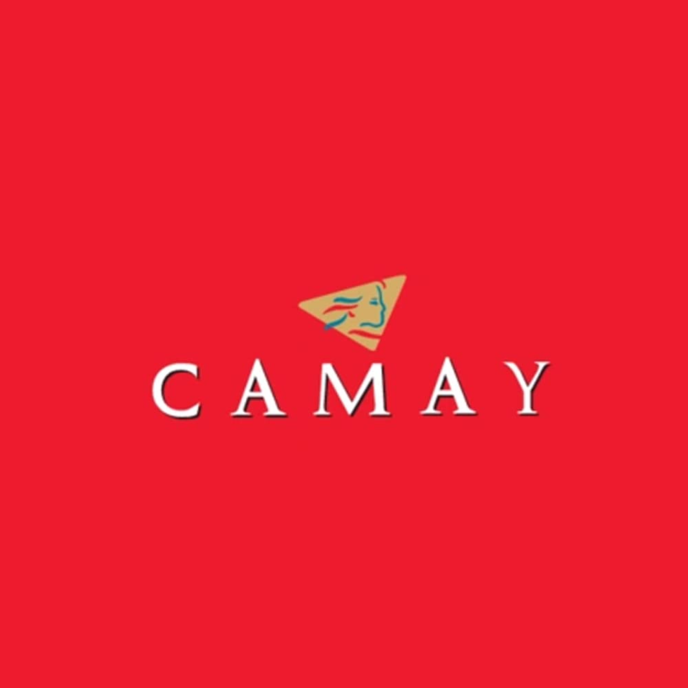 Camay bar next to a hand for size comparison and travel-friendly benefit