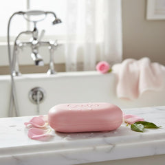 Camay classic in hands with wet lather demonstrating thorough cleanse benefit