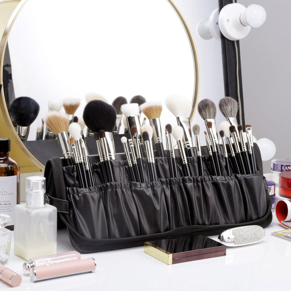 Camdeez Rownyeon on vanity in use with brushes ready for application and tidy workspace