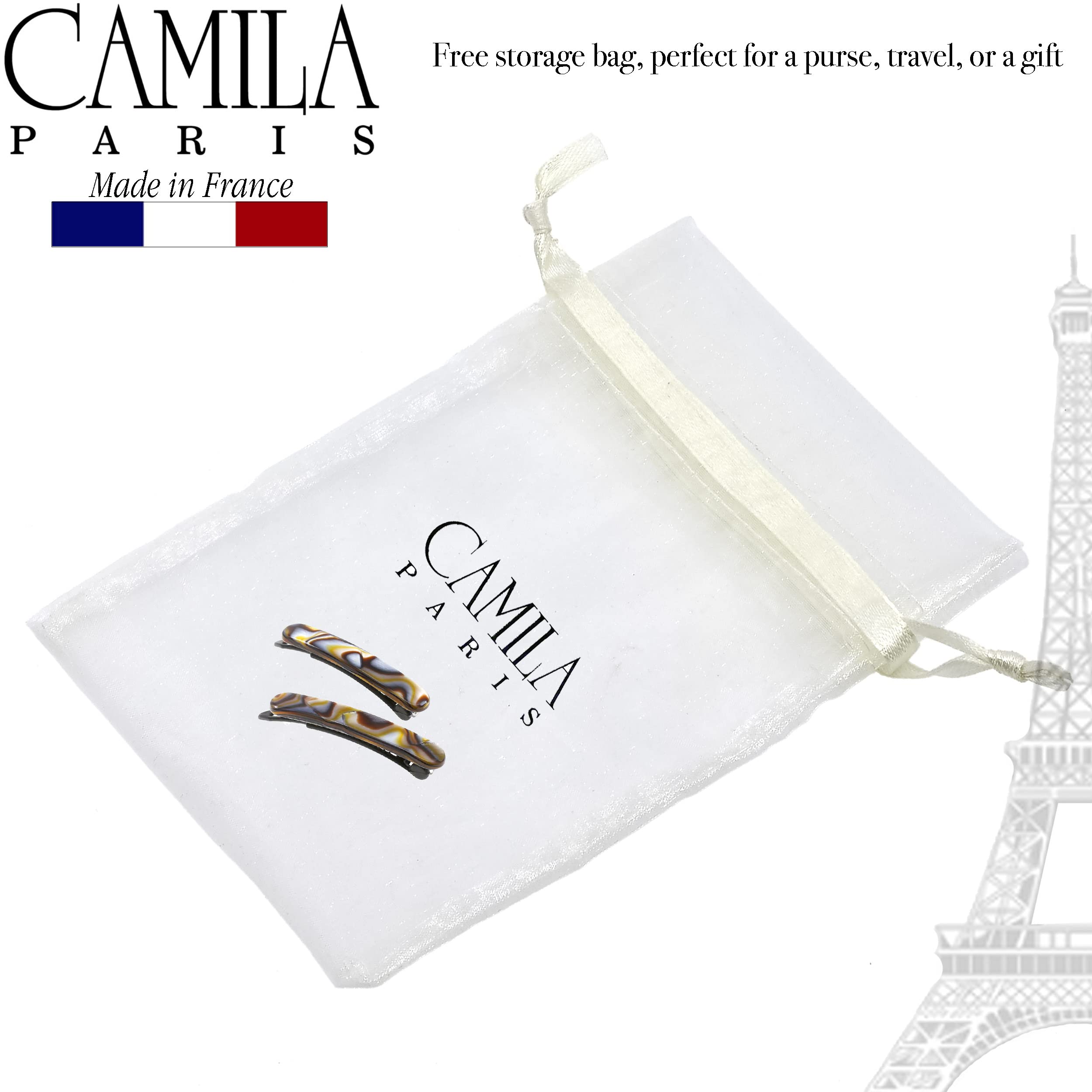 Camila Paris barrette next to coin illustrating compact 1.75-inch size benefit