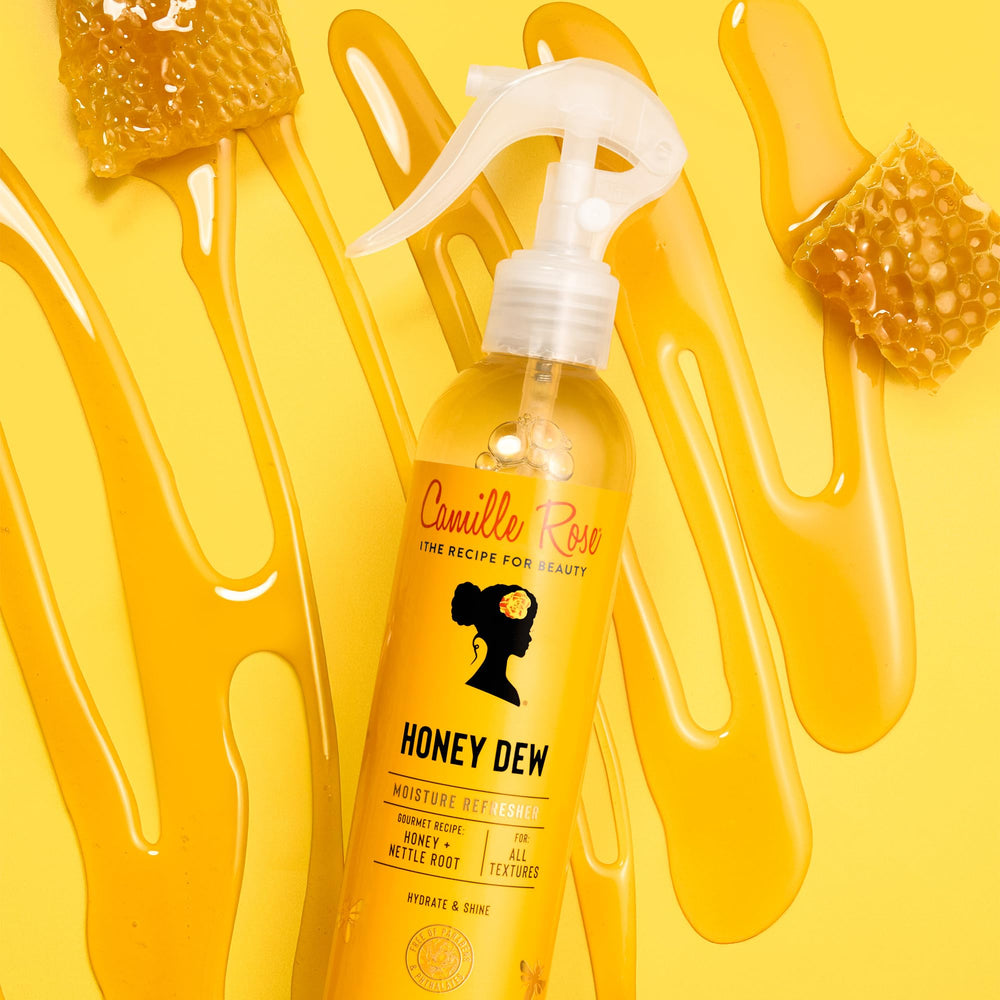 Camille Rose spray applied to curly hair showing improved detangling and shine