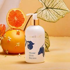 Capri Blue label illustration detail with gold accents, highlights fragrance-inspired design