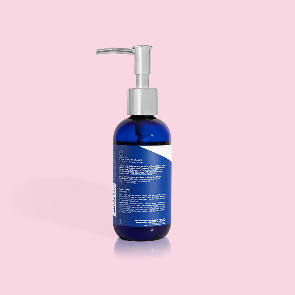 Capri Blue volcano bottle in styled bathroom scene signaling luxury hand care