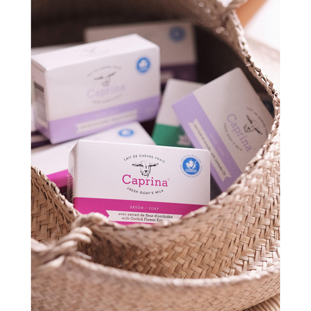 Caprina bar next to a ruler showing 3.2 oz size and travel-ready benefit