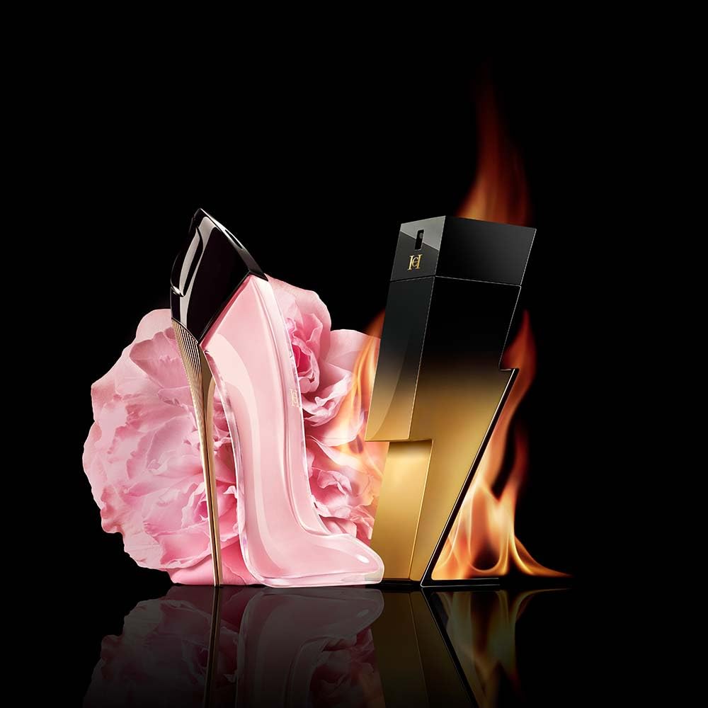 Carolina Herrera ingredient display with cacao and patchouli conveying warm depth