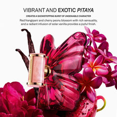 Carolina Herrera La Bomba spray in hand demonstrating easy on-the-go application