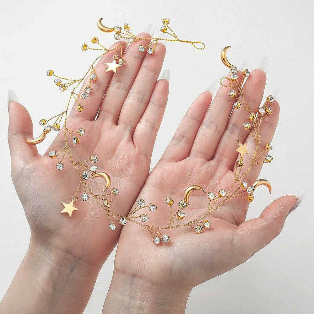 CASDRE close-up of star and moon charms highlighting fine metalwork