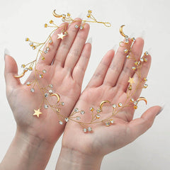 CASDRE close-up of star and moon charms highlighting fine metalwork