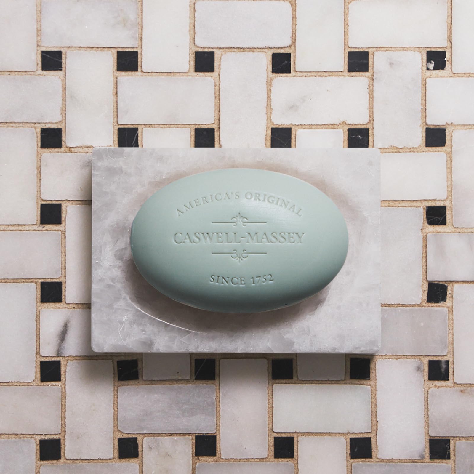 Caswell-Massey lather in hand demonstrating rich moisturizing foam