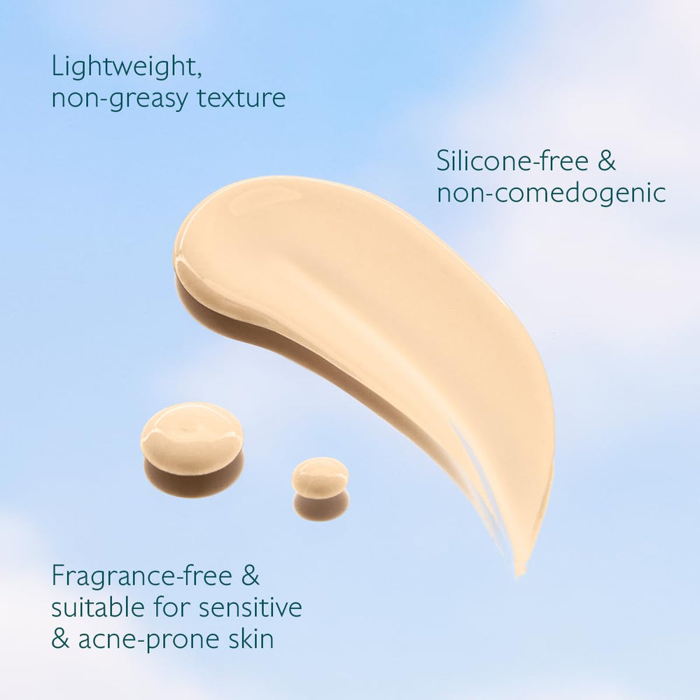 Caudalie applying serum to hand showing even application and skin-brightening benefit