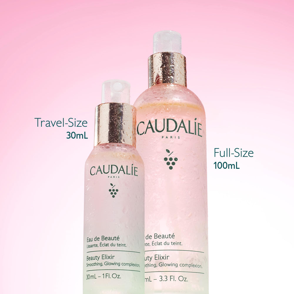 Caudalie Beauty Elixir in hand to show compact 30 mL scale for travel convenience