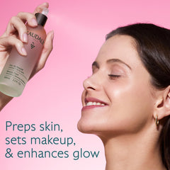 Caudalie mist nozzle spraying fine veil to set makeup quickly