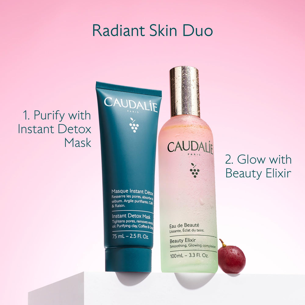 Caudalie Beauty Elixir on an office desk suggesting midday refresh and aromatherapy boost