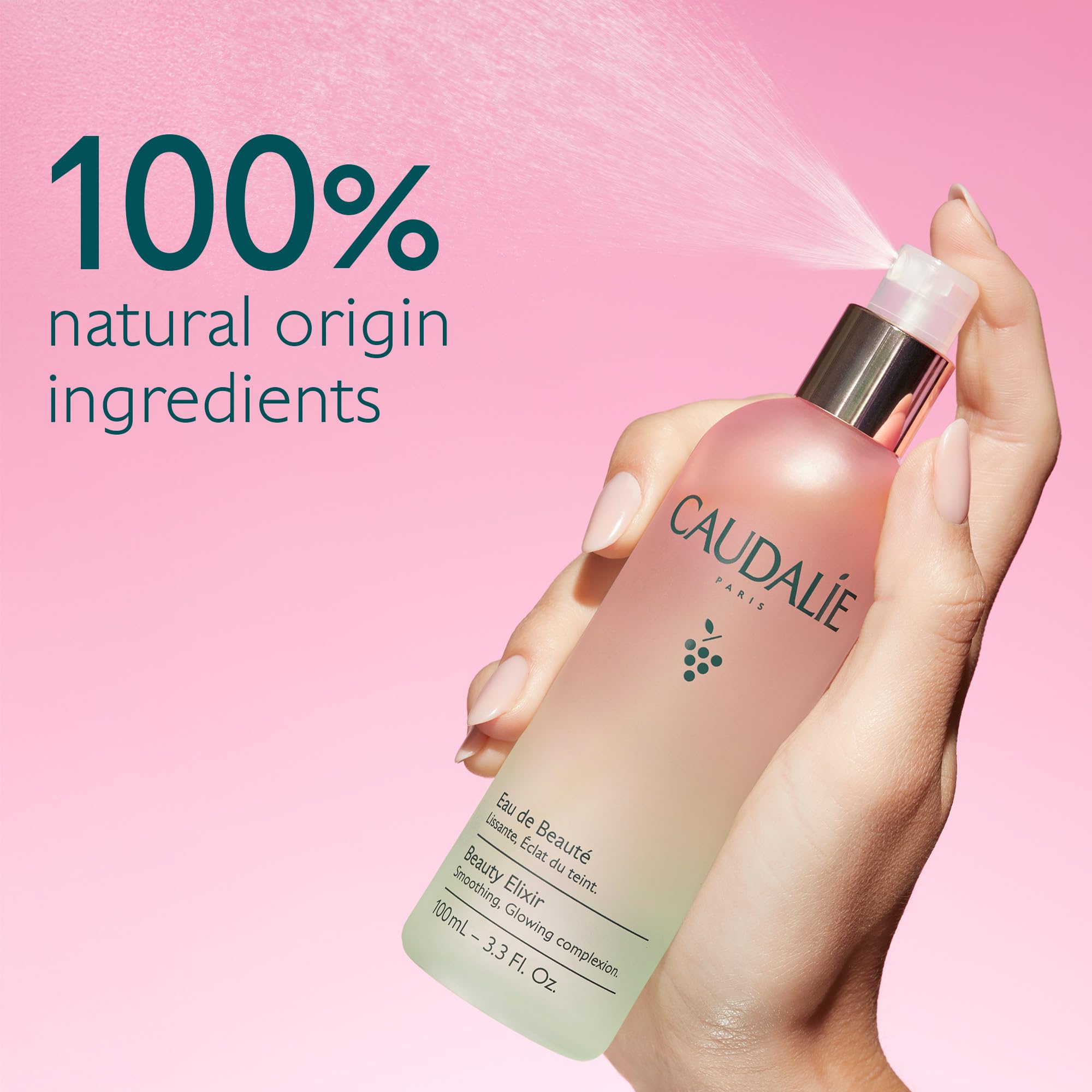 Caudalie Beauty Elixir mist spraying onto face showcasing even lightweight coverage